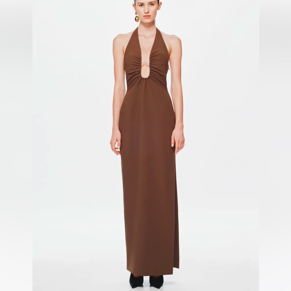 Light weight, form fitting but has some stretch. Worn once!